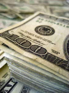 A stack of $100 bills?  Why yes, that's the best image to represent an article on earning royalties as a copywriter!