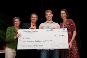 Here I am, being awarded a $10,000 "big check" prize as the industry's hottest up and coming direct response copywriter at AWAI's 2010 Bootcamp!